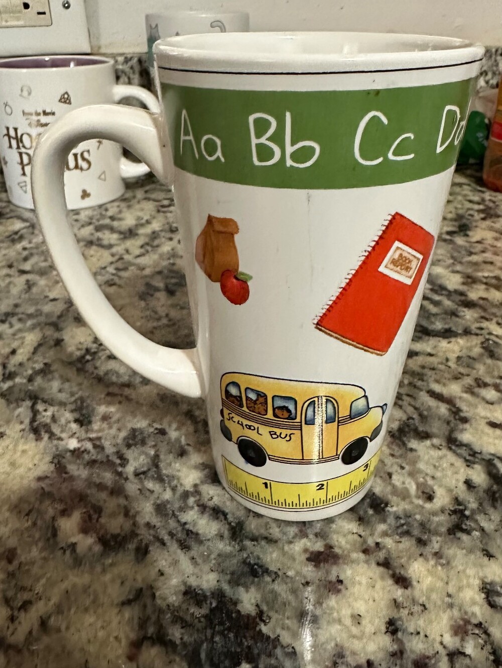 Beautiful cup with school-themed designs
